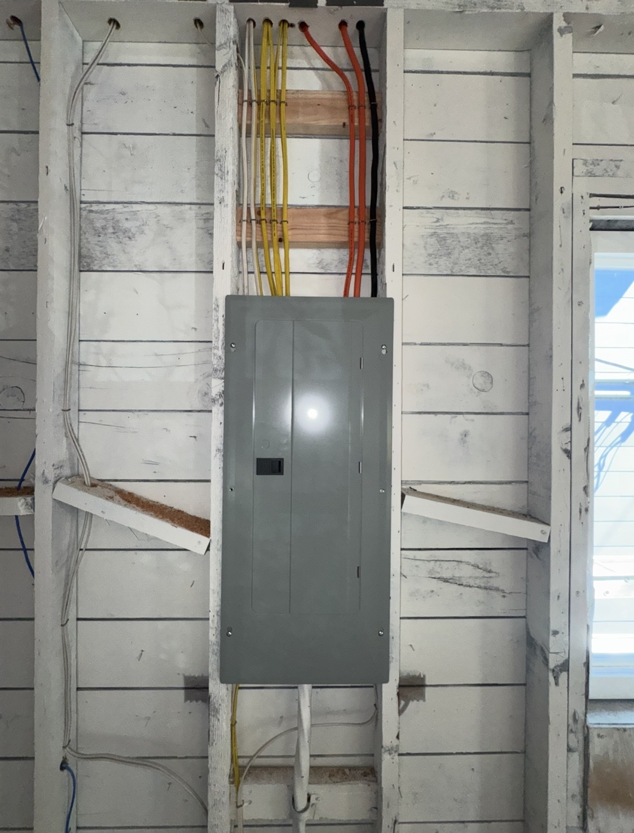 New wiring and panel work during a residential renovation.
