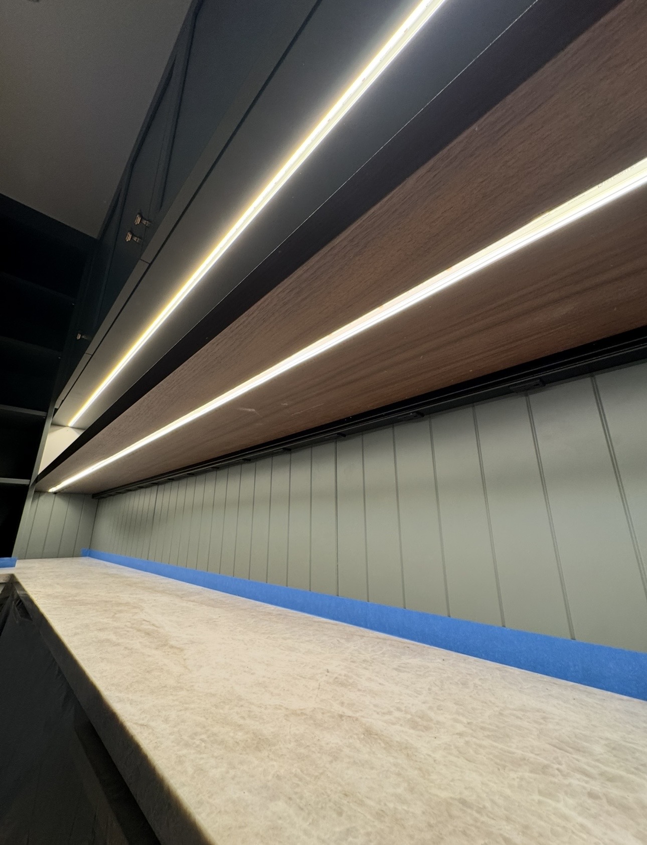 Clean linear lighting installed in a finished residential space.