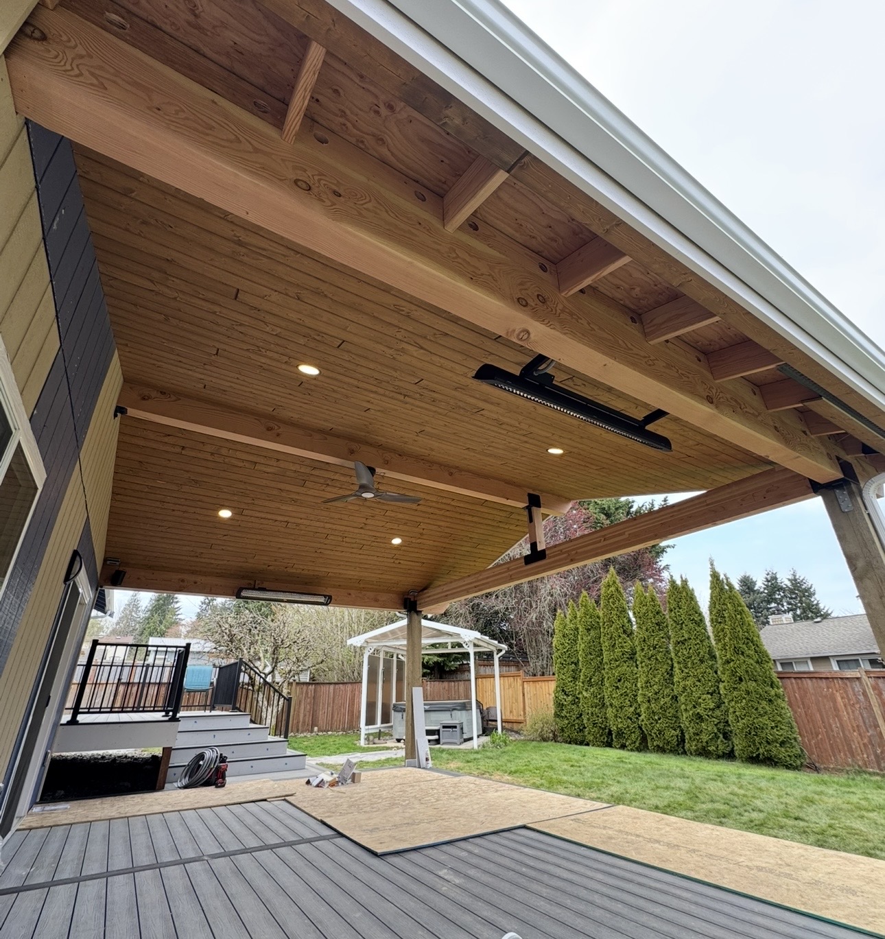 Finished outdoor living space with integrated lighting.