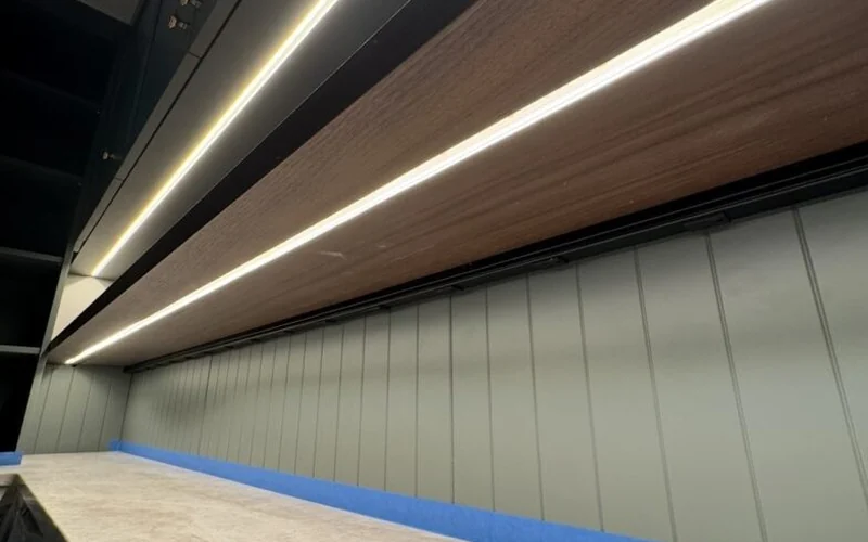 Installed linear lighting beneath a residential cabinet