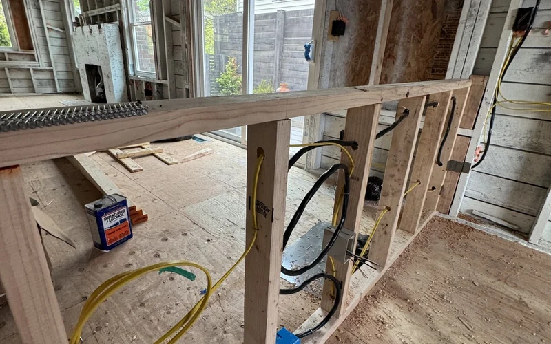 Open residential wall framing during rewiring